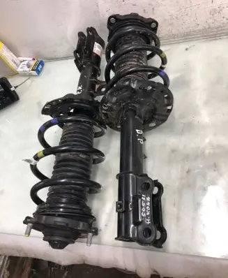 Hyundai Kona II Front shock absorber with coil spring 54650beda0