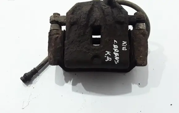 KIA Carens I Front brake caliper 0K2JA33990