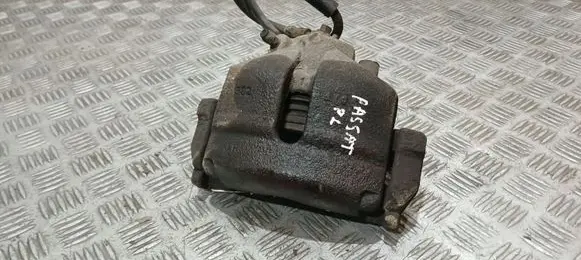 Volkswagen PASSAT B7 Front brake caliper 