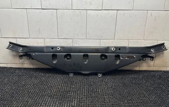 Top upper radiator support slam panel