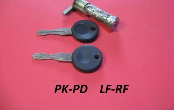 Volkswagen Golf II Front door lock (next to the handle) 604837166