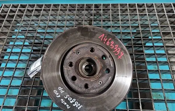 Front wheel hub spindle knuckle