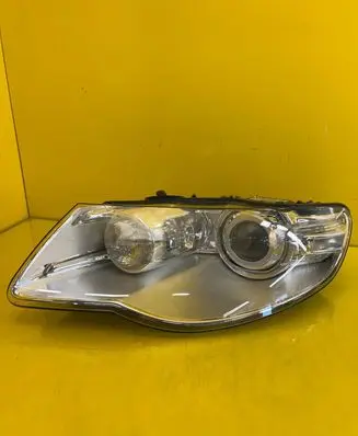 Volkswagen Touareg I Headlight/headlamp 7L6941031C