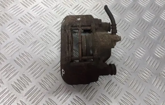 Mazda 323 Front brake caliper