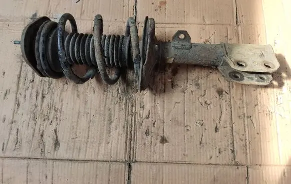 Toyota Corolla Verso AR10 Front shock absorber with coil spring