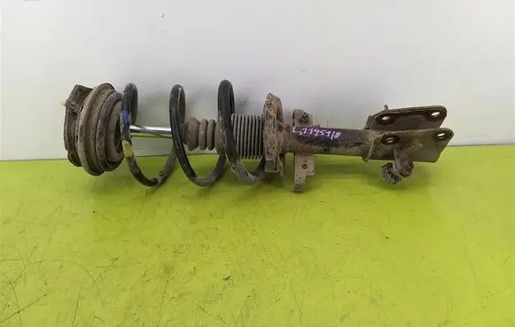 Renault Laguna II Front shock absorber with coil spring