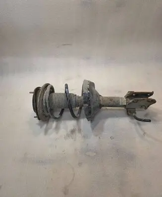 Subaru Legacy Front shock absorber with coil spring 