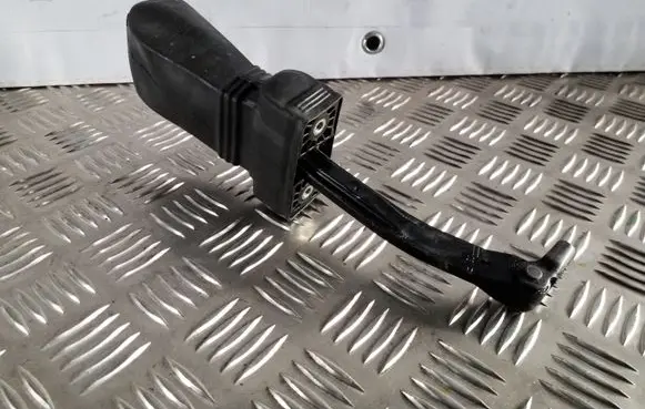 Front door check strap stopper