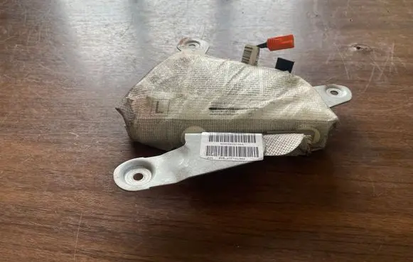 Front door airbag