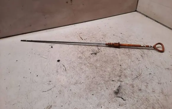Oil level dip stick