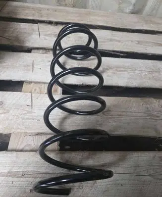 Volkswagen Polo II 86C 2F Front coil spring 