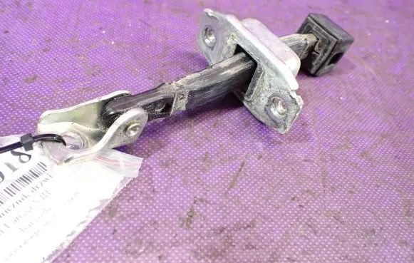 Mitsubishi Lancer VIII Front door check strap stopper