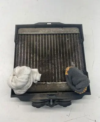 BMW X5 E70 Engine oil radiator 7572542 289440 P8413002