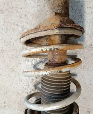 Subaru Impreza II Front shock absorber with coil spring