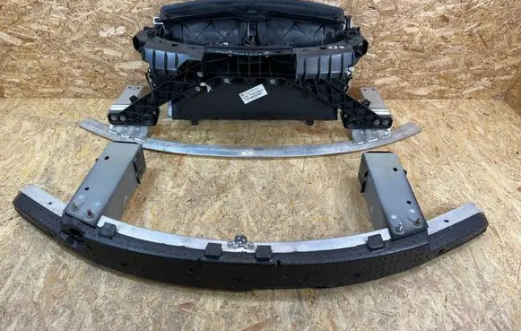 Radiator support slam panel