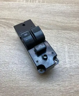 Mazda 323 Electric window control switch BJ3E66350