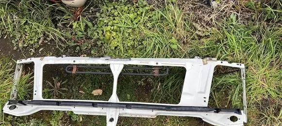 Top upper radiator support slam panel