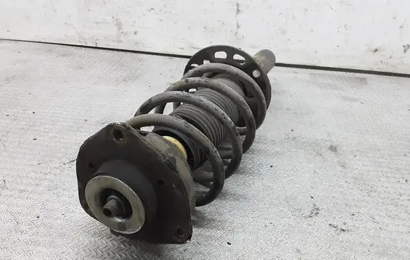 Volkswagen Jetta V Front shock absorber with coil spring