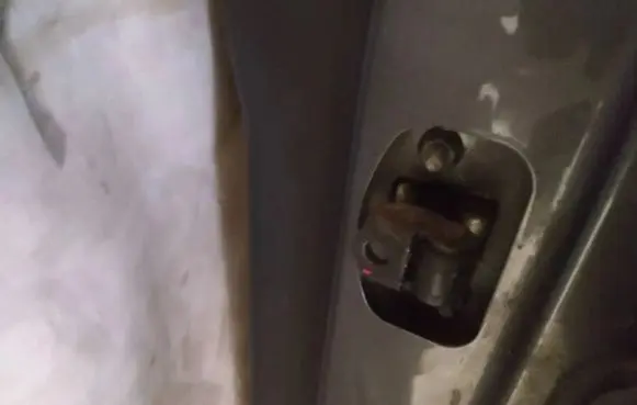 Volvo V50 Rear door check strap stopper
