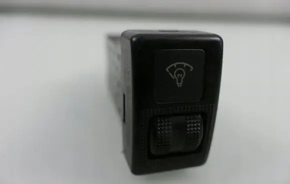 Panel lighting control switch