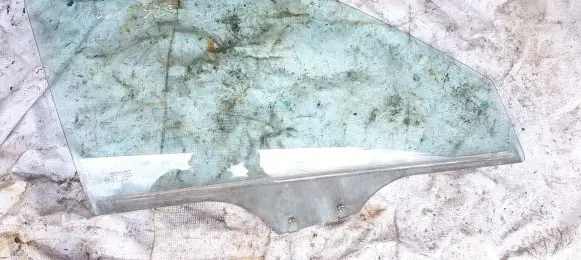 Mazda 323 Front door window glass four-door