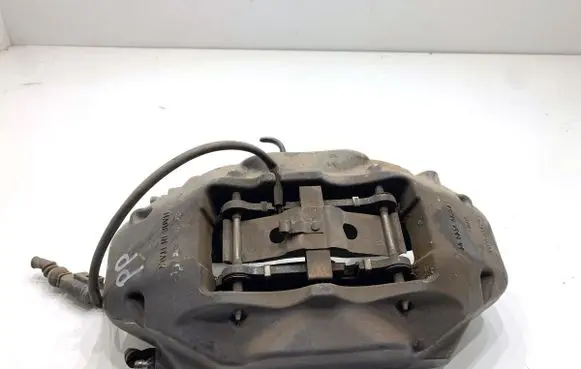 Volkswagen Touareg II Front brake caliper 