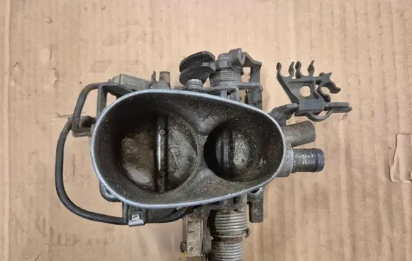 Volkswagen Golf II Throttle valve 027133063G 027G