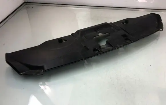 Engine bonnet/hood lock trim molding