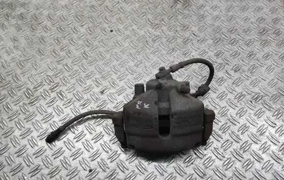 Volkswagen PASSAT B7 Front brake caliper 581VL