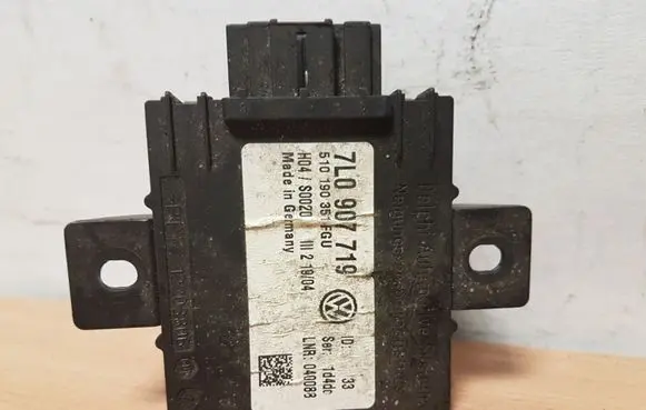 Volkswagen Touareg I Alarm control unit/module 7L0907719