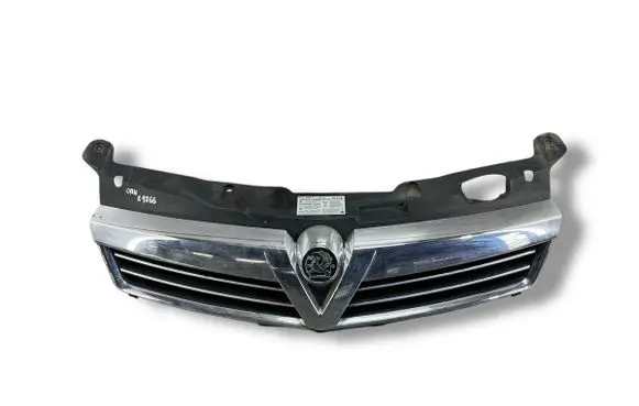 Opel Astra H Front bumper upper radiator grill 13225788 13225789