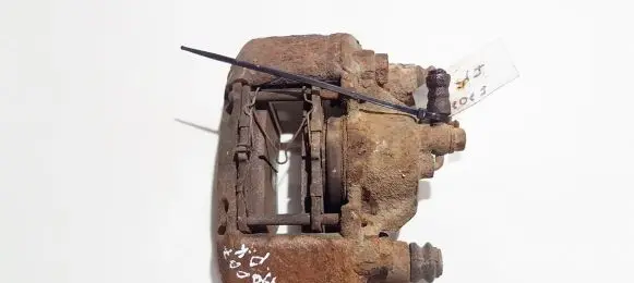 Mazda 323 F Front brake caliper