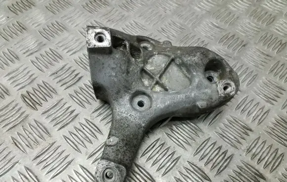 Volkswagen Golf V A/C compressor mount bracket 1K0260885B
