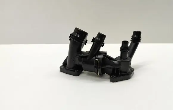 Thermostat/thermostat housing