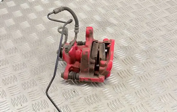 Volkswagen Polo VI Rear brake caliper