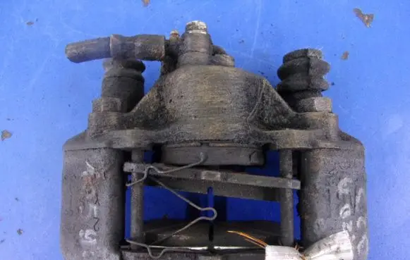 Mazda 323 Front brake caliper
