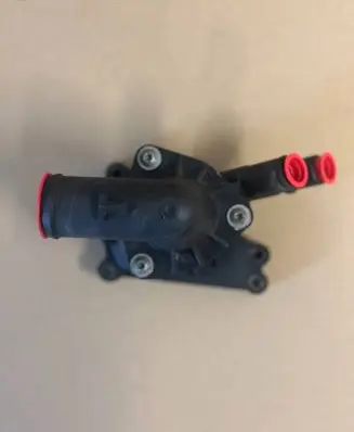 Thermostat/thermostat housing