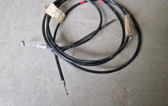 Mitsubishi L200 Fuel cap flap release cable MR144483