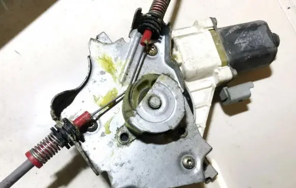 Nissan Micra Front door window regulator motor