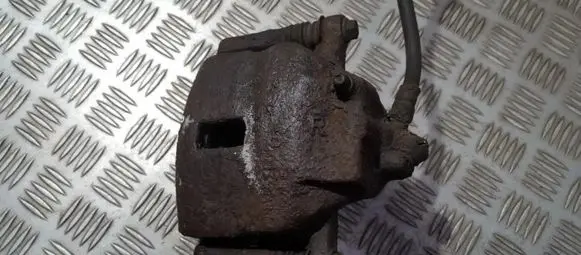 Nissan Almera N16 Front brake caliper
