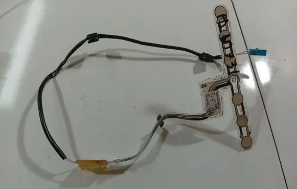 Volkswagen Golf V Seat heating element 1K0963553