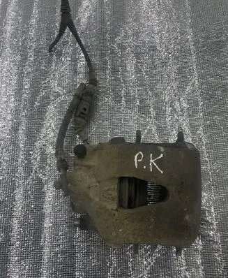 Volkswagen Golf V Front brake caliper
