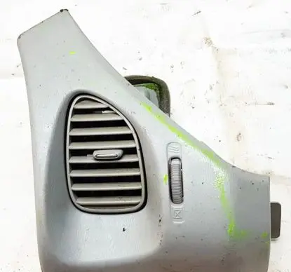 Nissan Almera Tino Dash center air vent grill 68761BU200