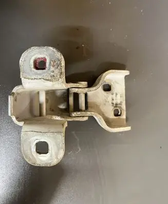 Front door lower hinge