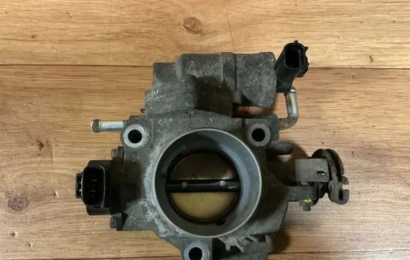 Mazda 3 I Throttle valve