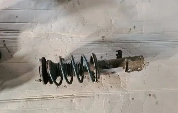 Toyota Corolla E120 E130 Front shock absorber with coil spring