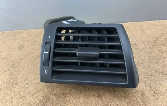 Dash center air vent grill