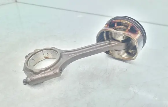 Piston with connecting rod