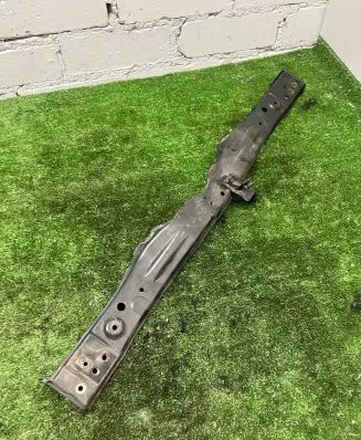 Top upper radiator support slam panel