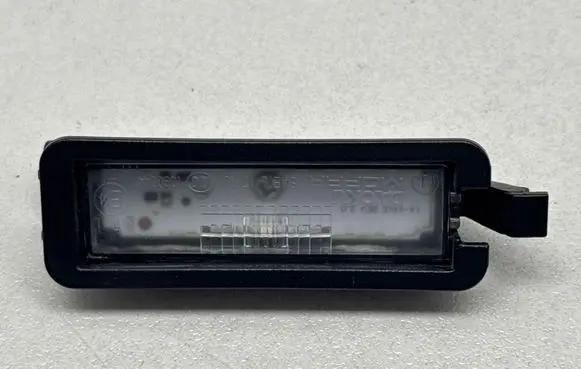 Chrysler Pacifica Number plate light 68276972AA 144583